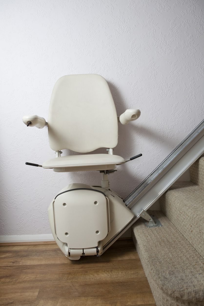 Stair lift at the bottom of the stairs
